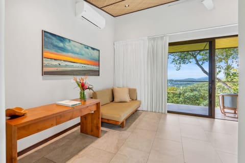 Sunset Premium Villa, 1 King Bed, Balcony, Ocean View | Minibar, in-room safe, individually decorated, individually furnished