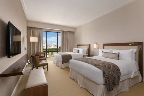 Deluxe Room, 2 Queen Beds, Non Smoking, City View | Premium bedding, minibar, in-room safe, desk