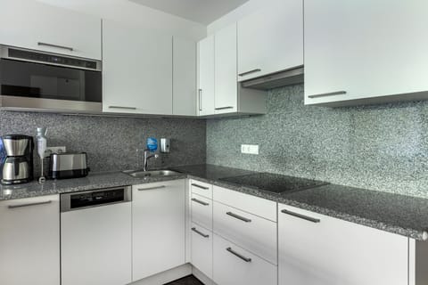 Apartment, 2 Bedrooms | Private kitchen | Fridge, microwave, stovetop, dishwasher
