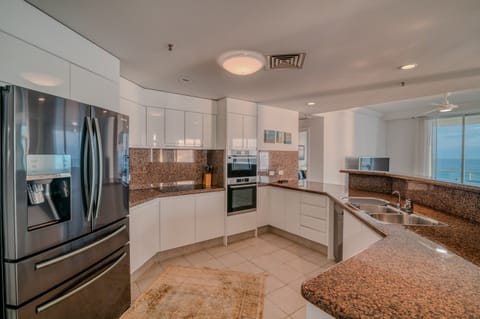 Luxury Three Bedroom Suite | Private kitchen | Full-size fridge, microwave, oven, stovetop