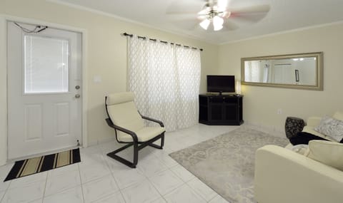 Suite, 1 Bedroom (New York) | Living area | 30-inch flat-screen TV with cable channels, Smart TV