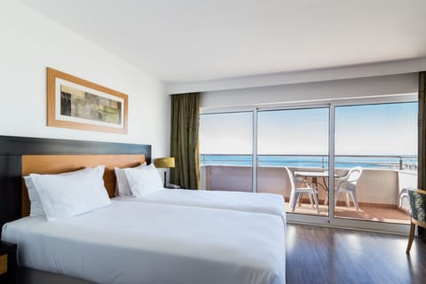 Double or Twin Room, Sea View | Minibar, in-room safe, desk, cribs/infant beds