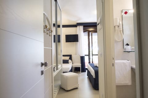 Premium Triple Room | Minibar, in-room safe, desk, free WiFi