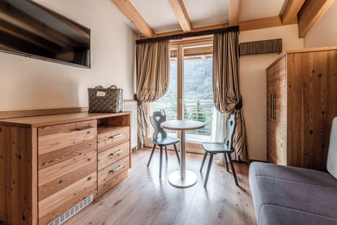 Suite con Balcone train side | Minibar, in-room safe, desk, free WiFi