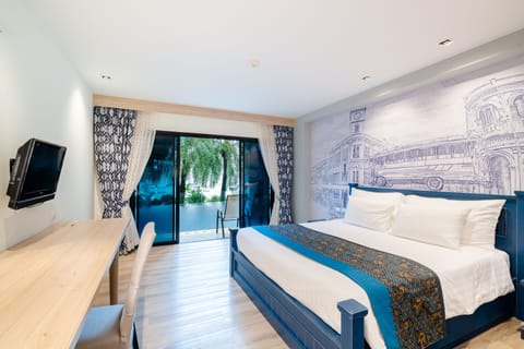 Boutique Deluxe Pool Access | In-room safe, blackout drapes, soundproofing, iron/ironing board