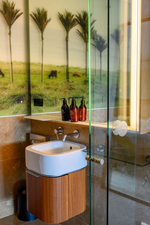 Superior | Bathroom | Eco-friendly toiletries, hair dryer, bathrobes, slippers