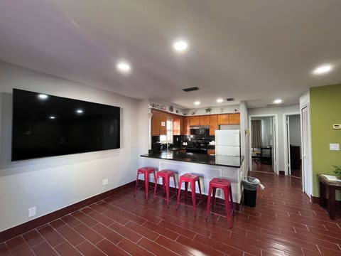 Suite, 2 Bedrooms, Non Smoking, Ground Floor (Two-Bedroom) | Living area | 55-inch flat-screen TV with cable channels