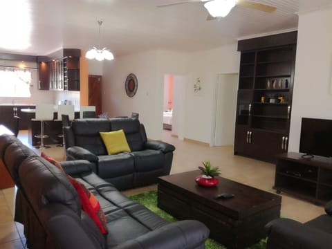 Basic Apartment | Living area | 70-cm flat-screen TV with premium channels, TV