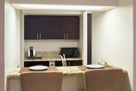 Suite, 2 Bedrooms | Private kitchenette | Fridge, microwave, coffee/tea maker, eco-friendly cleaning products