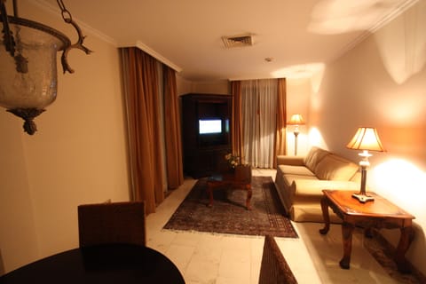 Superior Suite | Living room | Flat-screen TV