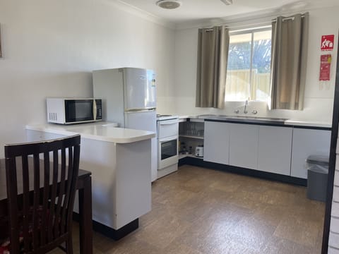 Standard Apartment, 2 Bedrooms (Unit 2) | Private kitchen | Full-size fridge, microwave, oven, stovetop