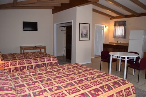 Standard Room, 2 Queen Beds | Desk, rollaway beds, WiFi, bed sheets