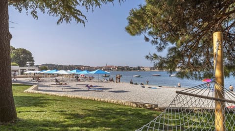 Beach nearby, sun loungers, beach umbrellas, beach volleyball