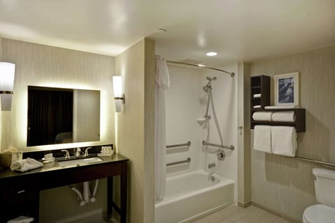 Suite, 1 King Bed, Accessible, Non Smoking | Bathroom | Combined shower/tub, designer toiletries, hair dryer, towels