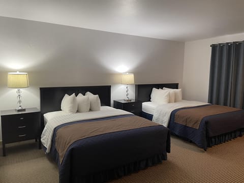 Standard Room, 2 Queen Beds | Soundproofing, rollaway beds, free WiFi, bed sheets