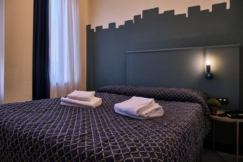 Family Quadruple Room | In-room safe, desk, blackout drapes, free WiFi