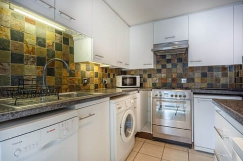 Classic Apartment, 1 Bedroom | Private kitchen | Fridge, microwave, stovetop, dishwasher