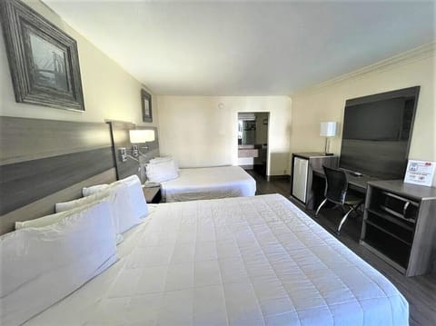 Room, 2 Queen Beds, Non Smoking | Individually furnished, desk, soundproofing, iron/ironing board