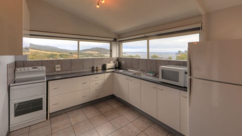 Three Bedroom House | Private kitchen | Fridge, microwave, oven, stovetop