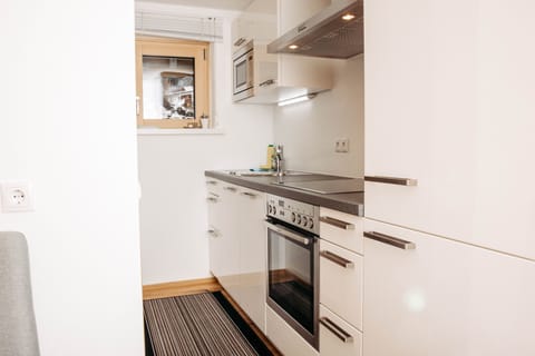 Deluxe Apartment, 1 Bedroom | Living area | Flat-screen TV