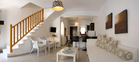 Duplex | Living room | 24-inch Smart TV with cable channels, TV, fireplace