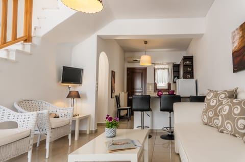 Duplex | Living room | 24-inch Smart TV with cable channels, TV, fireplace