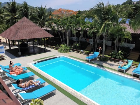 Outdoor pool, open 7:00 AM to 8:00 AM, sun loungers
