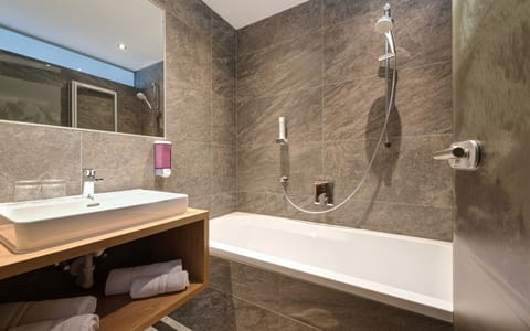 Family Room (Enzian Deluxe ) | Bathroom | Hair dryer, towels