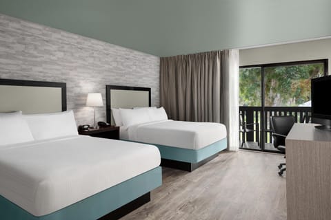 Deluxe Room, 2 Queen Beds, Balcony, Courtyard View | Hypo-allergenic bedding, in-room safe, desk, laptop workspace