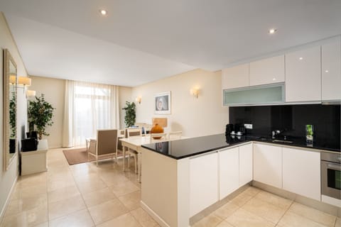 Luxury Suite, 1 Bedroom | Private kitchen | Fridge, microwave, oven, stovetop