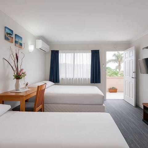 Laptop workspace, iron/ironing board, free WiFi, bed sheets