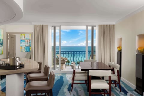 Suite, 1 King Bed (Palmbeach Club) | Living area | 50-inch LED TV with cable channels, TV, iPod dock