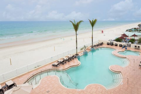 Outdoor pool, pool umbrellas, sun loungers