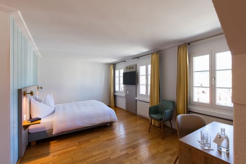 Junior Suite, Courtyard View | In-room safe, desk, free WiFi, bed sheets