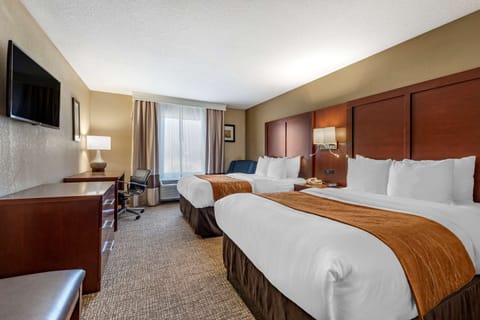 Premium bedding, pillowtop beds, desk, blackout drapes
