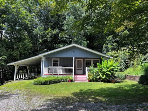 Nestled against the woods, cozy and private.