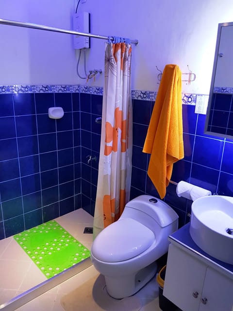 Premier Suite, Ocean View | Bathroom | Shower, rainfall showerhead, towels, soap
