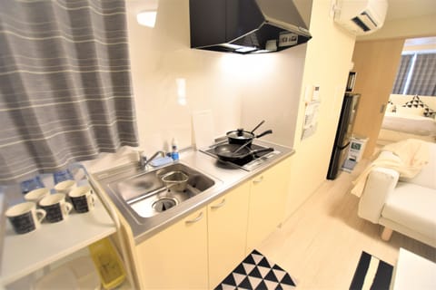 2 Bedroom Apartment (4B​) | Private kitchen | Fridge, microwave, stovetop, rice cooker