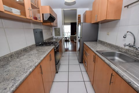 Deluxe Apartment, 2 Bedrooms, Ocean View, Oceanfront | Private kitchen | Fridge, microwave, oven, stovetop