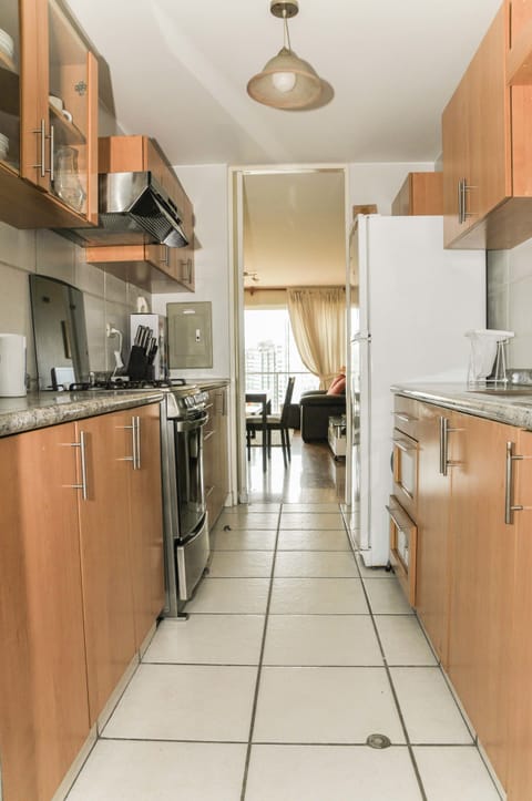 Deluxe Apartment, 2 Bedrooms, Ocean View, Oceanfront | Private kitchen | Fridge, microwave, oven, stovetop