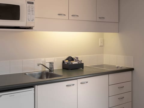 One Bedroom Suite | Private kitchenette | Fridge, microwave, stovetop, electric kettle