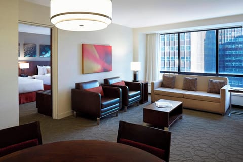 Deluxe Suite, Multiple Beds | Pillowtop beds, in-room safe, desk, laptop workspace