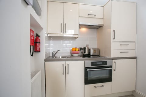 Superior Apartment, 1 Bedroom, Non Smoking, Kitchen | Laptop workspace, iron/ironing board, free WiFi, bed sheets