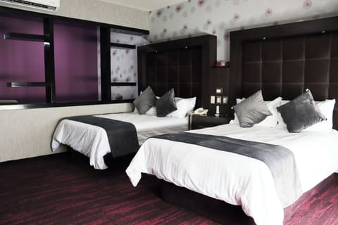 Suite, 2 Double Beds, Non Smoking | Free minibar items, in-room safe, desk, iron/ironing board