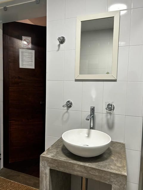 Quadruple Room | Bathroom | Shower, towels