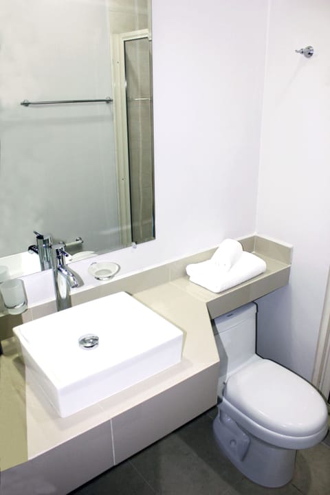 Economy Room, 2 Bedrooms | Bathroom | Shower, free toiletries, towels