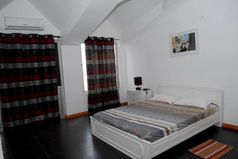 Apartment, 2 Bedrooms | Premium bedding, iron/ironing board, rollaway beds, free WiFi