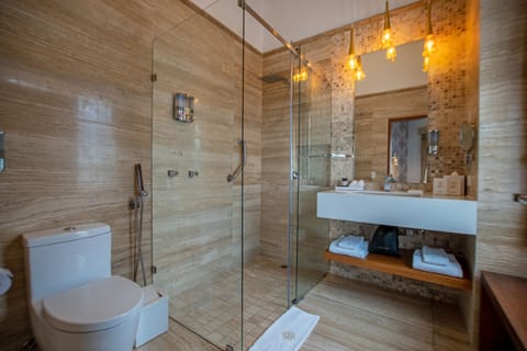 Luxury Suite, Balcony, City View | Bathroom | Shower, free toiletries, hair dryer, bathrobes