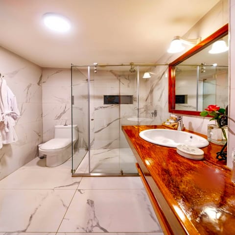 Family Apartment, 2 Bedrooms, 2 Bathrooms, Courtyard View | Bathroom | Shower, rainfall showerhead, eco-friendly toiletries, hair dryer
