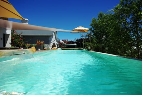 2 outdoor pools, pool umbrellas, sun loungers